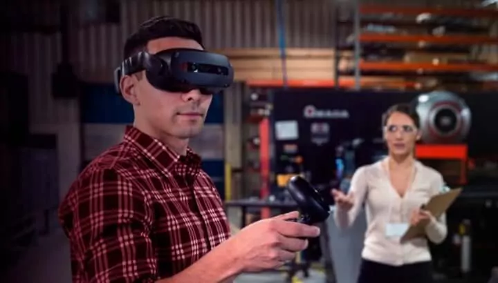A man plays in VR glasses